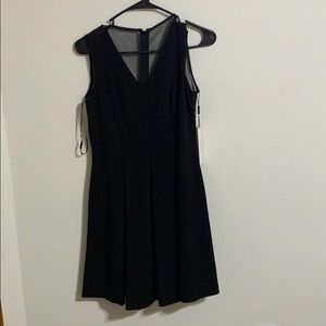 Calvin Klein BNWT size 4 p black